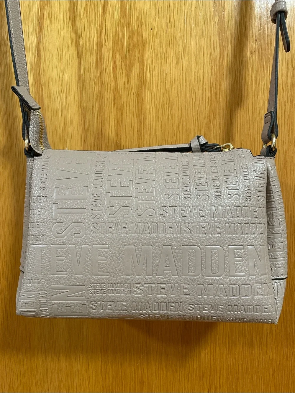 Steve Madden embossed logo crossbody bag beige long adjustable strap